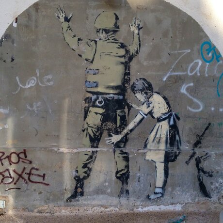 Autre fresque de Banksi sur le mur entre Israël et Cisjordanie